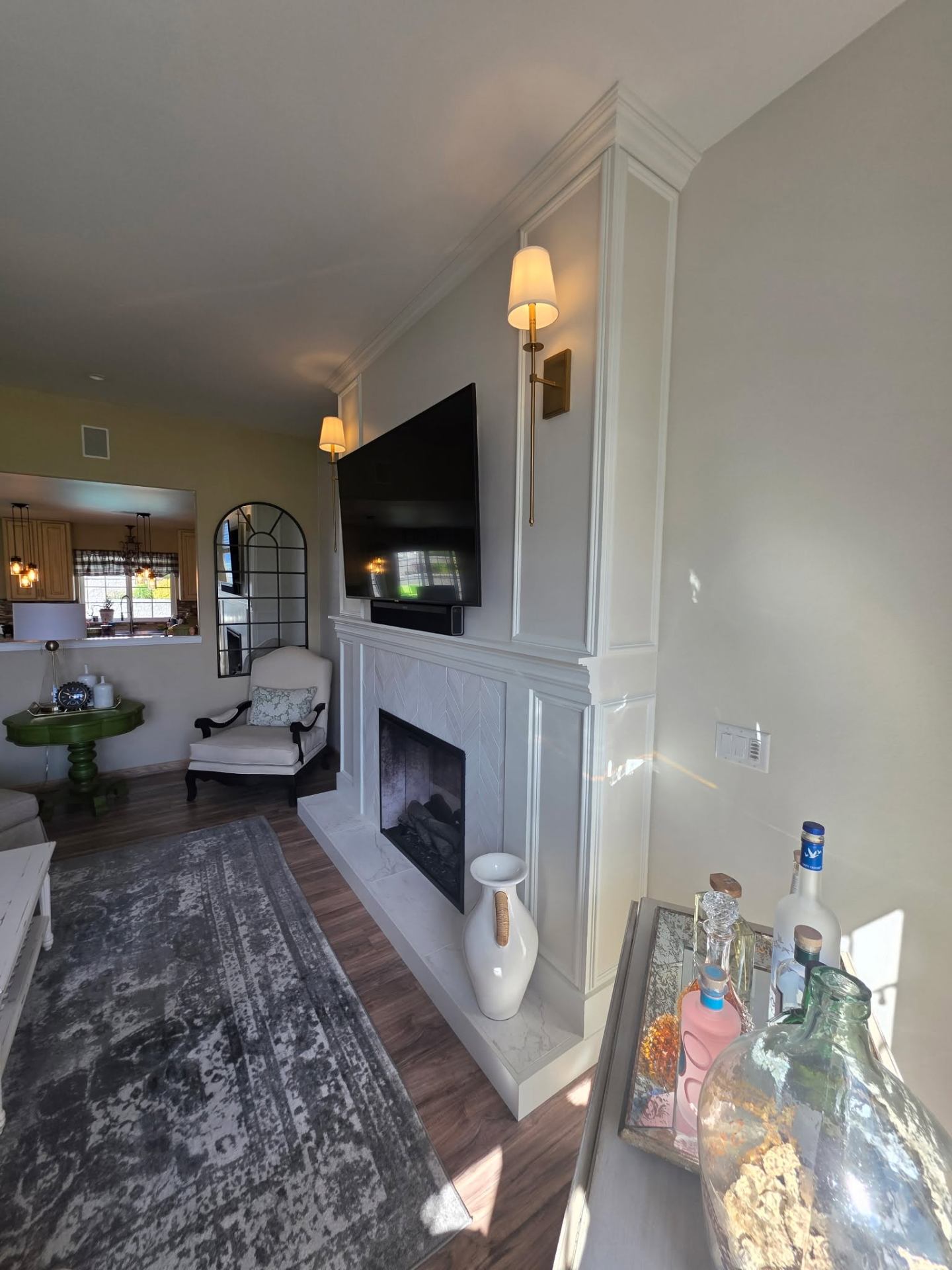 Side angle of custom fireplace and feature wall in remodeled Chelan living room