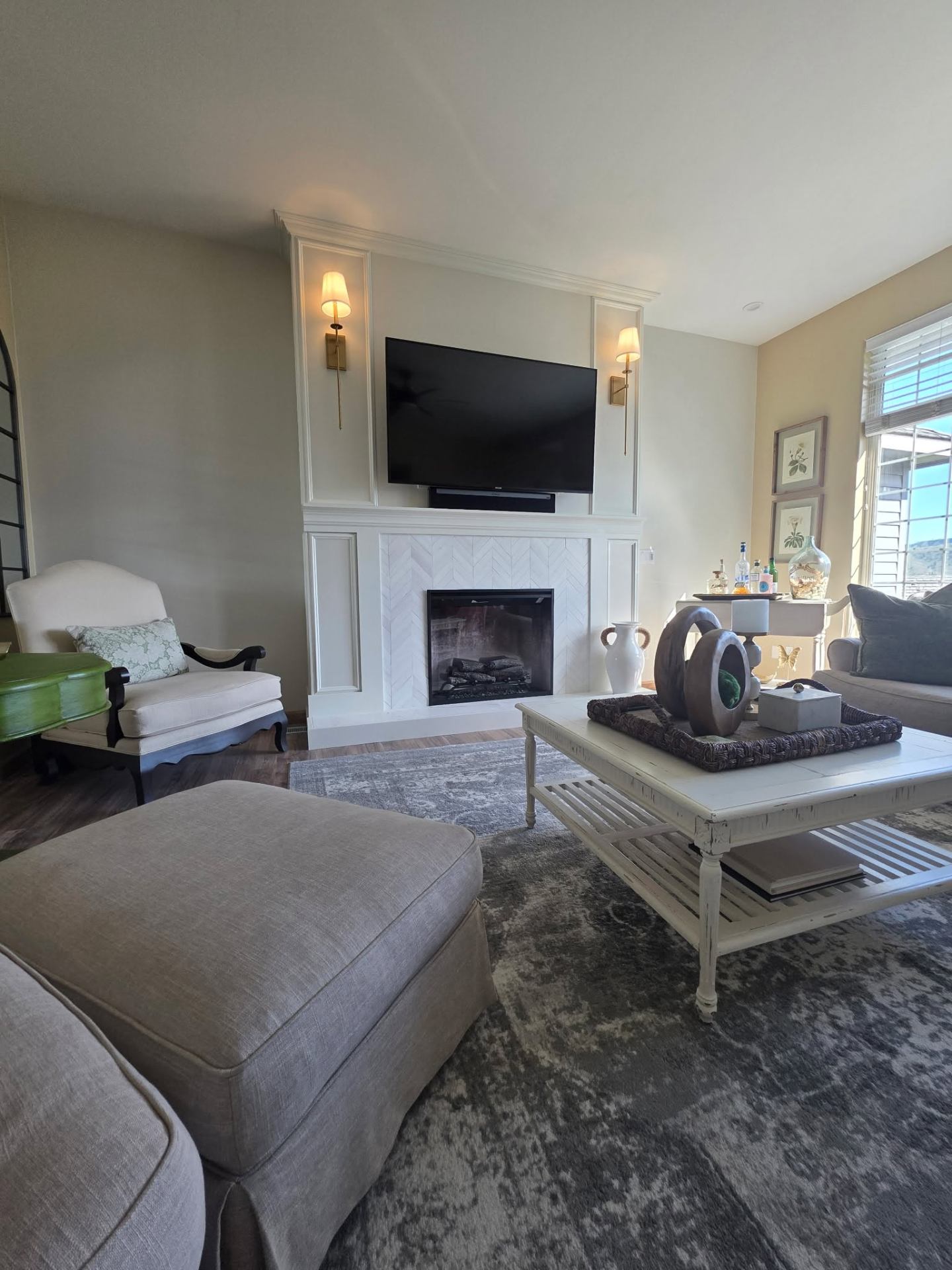 Living room fireplace build-out with crown molding and warm white paint