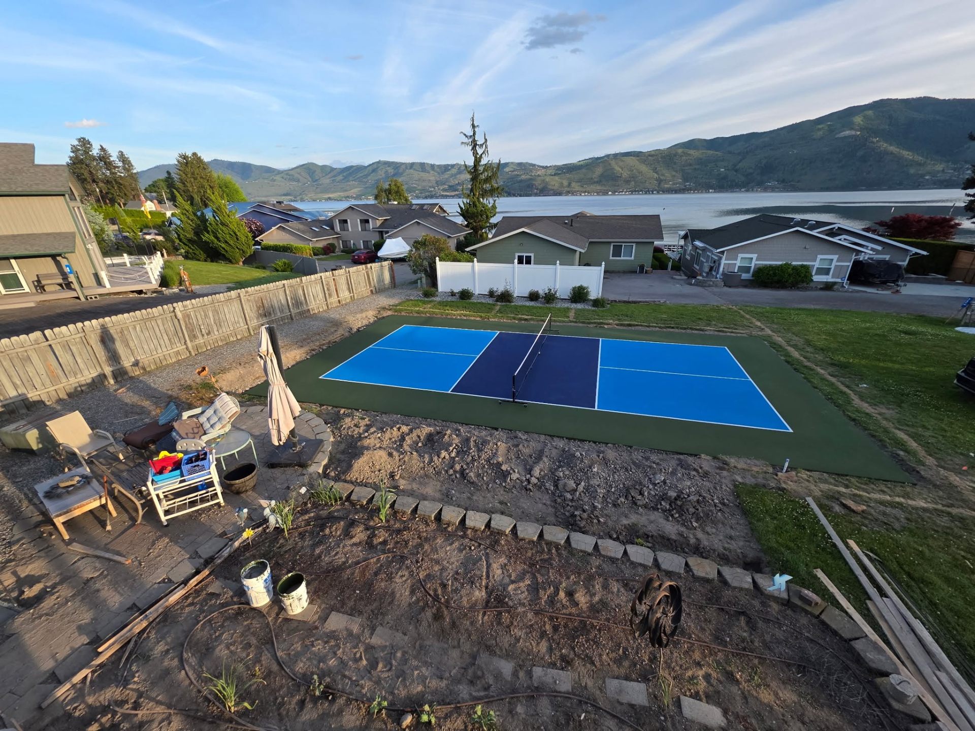 Aerial view of finished backyard pickleball court overlooking Lake Chelan