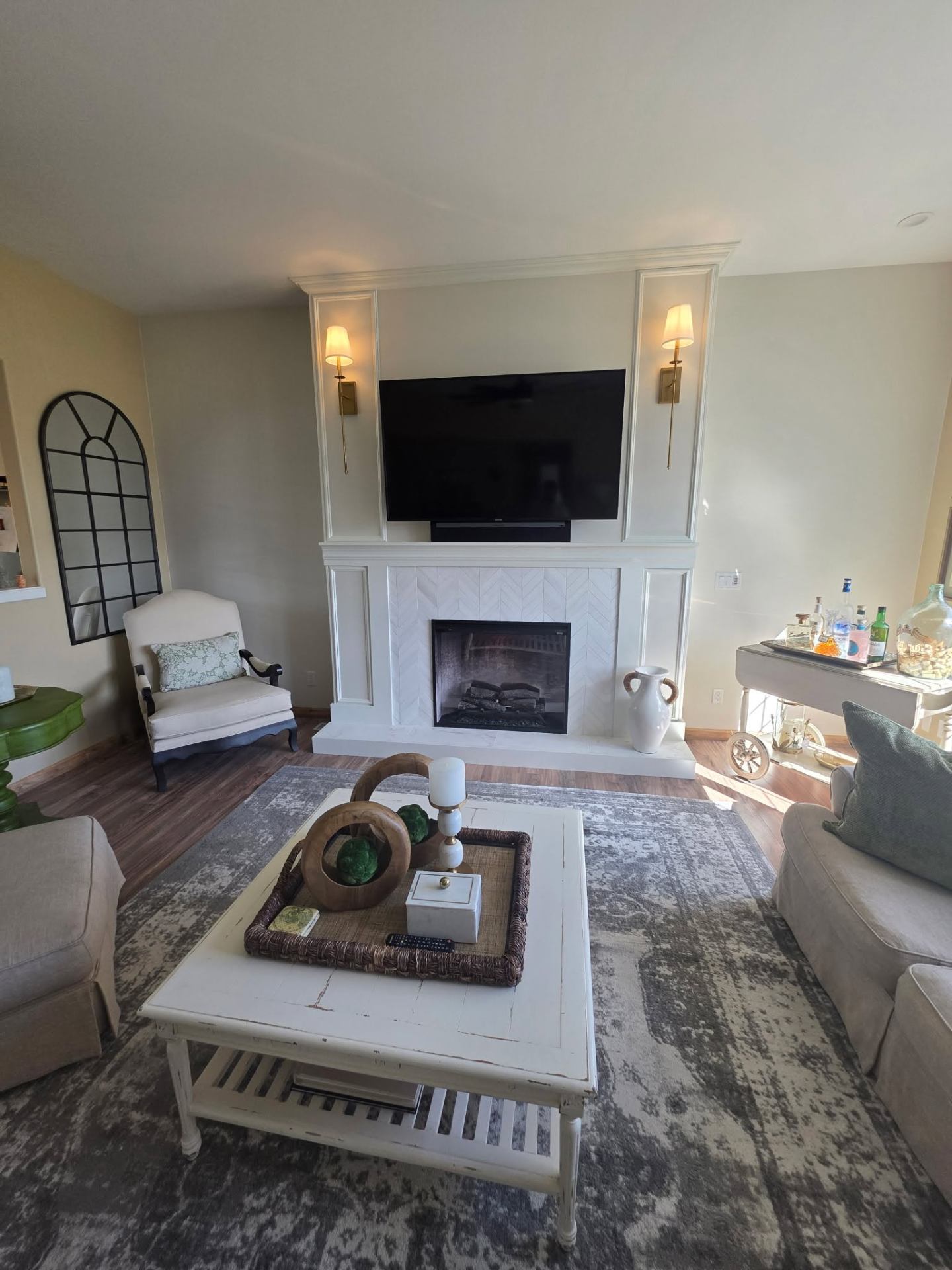 Finished Chelan living room remodel with custom fireplace surround and decor